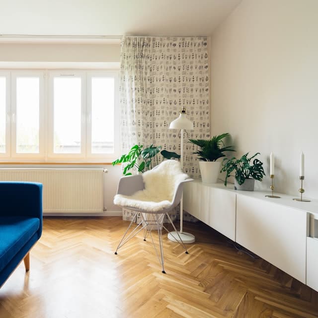 A bright room with a reading chair