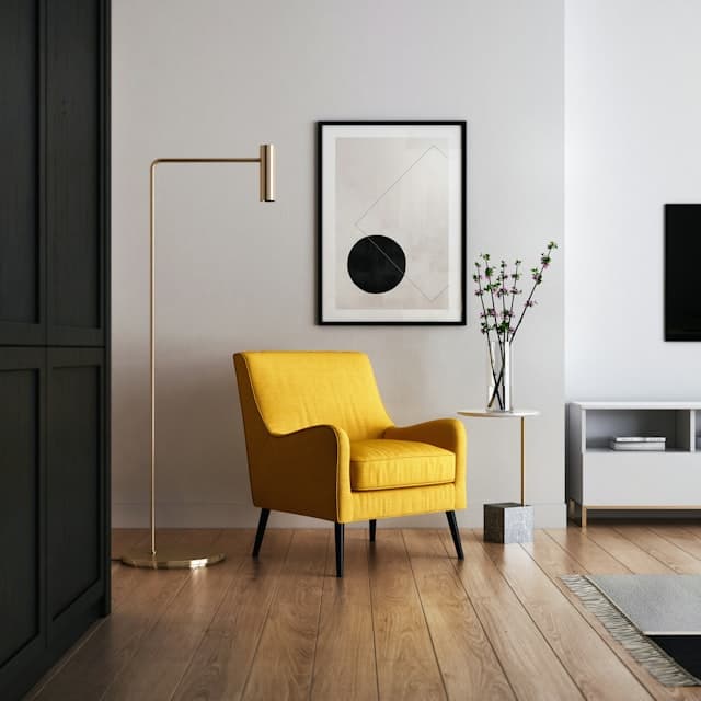 A mustard chair in a quiet room